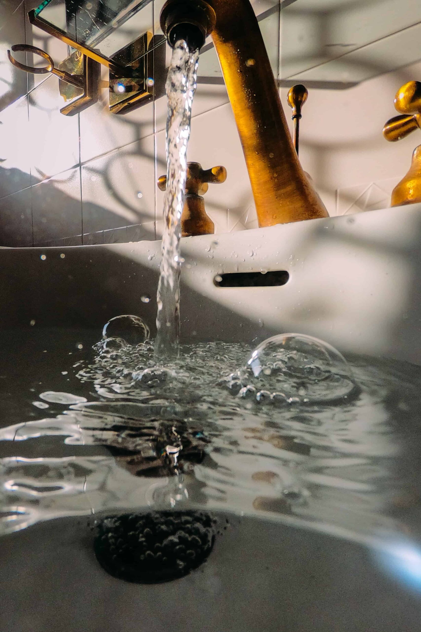 how to remove bathroom sink drain
